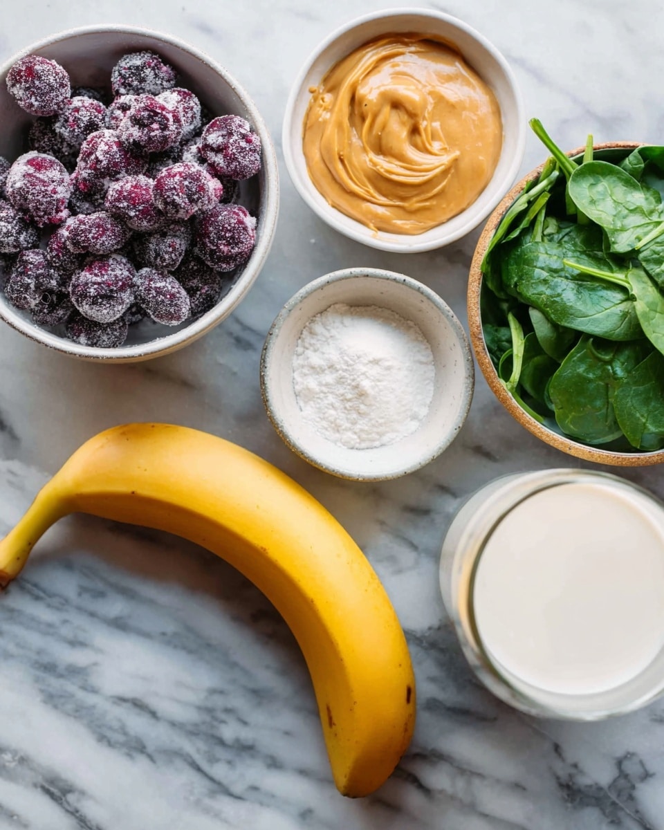 The image shows a close-up of several bowls and a banana placed on a white marbled surface. There are five dishes in total: a white bowl filled with frozen dark purple berries with a powdered sugar layer on top, a small white bowl of creamy orange peanut butter, a small white bowl with a white powder, another white bowl with fresh green spinach leaves, and a glass of white liquid, likely milk. A bright yellow banana with a smooth texture is positioned horizontally in the center bottom of the image. The bowls and glass have simple textures, and the overall setting feels fresh and natural. photo taken with an iphone --ar 4:5 --v 7
